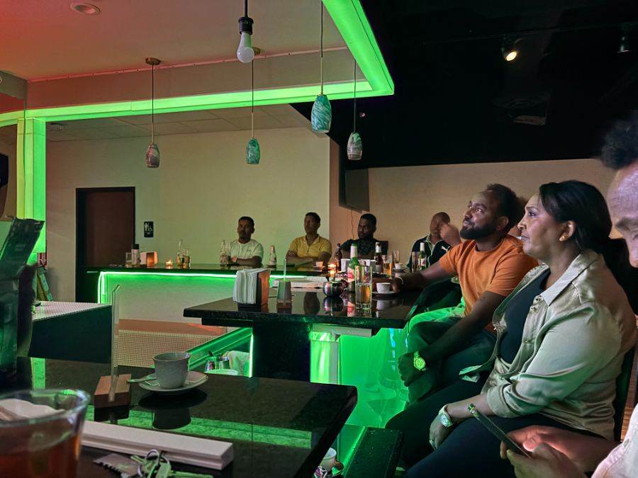 Guests enjoying drinks at the Banna bar